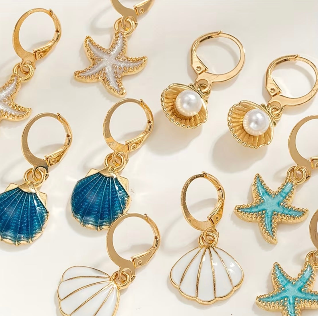 Boucles D’Oreilles Coquillage Dorées Avec Perle Élégante